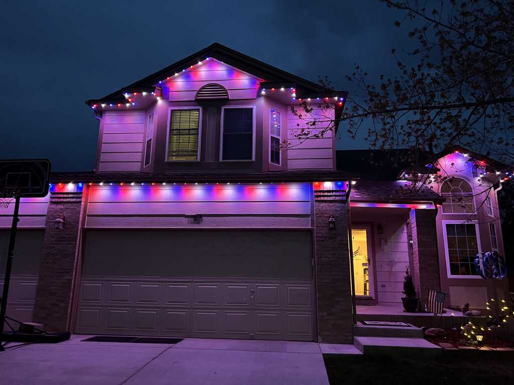 Color-changing TruLight permanent LED lighting on a Kansas City metro residence
